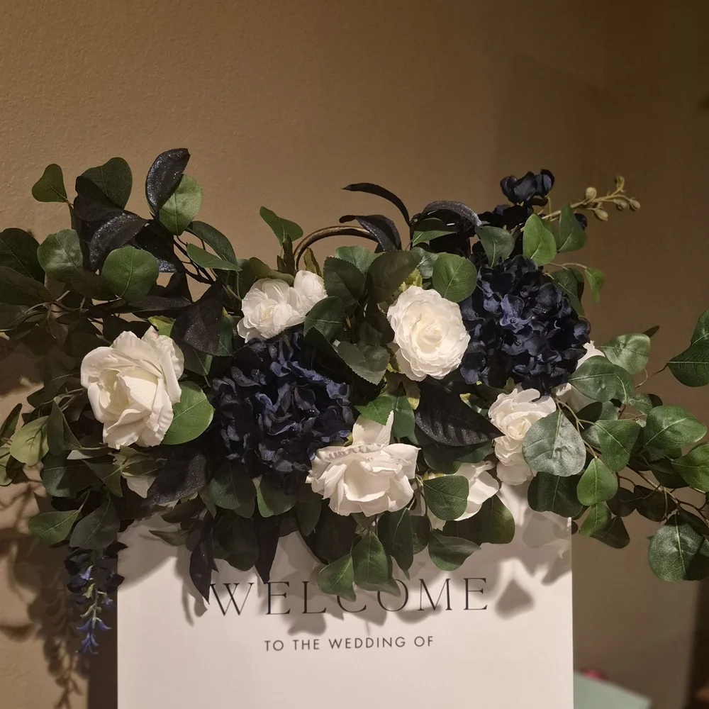 Elegant Floral Arrangement with White and Blue Accents